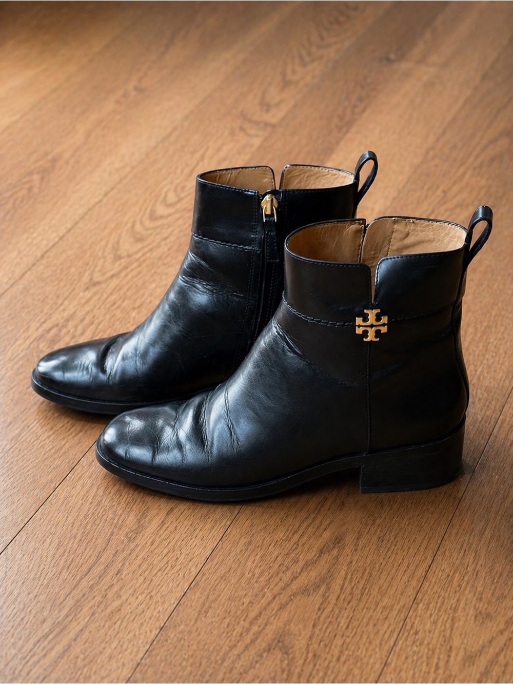 Tory Burch Black Leather Ankle Boots with Gold Logo Accent